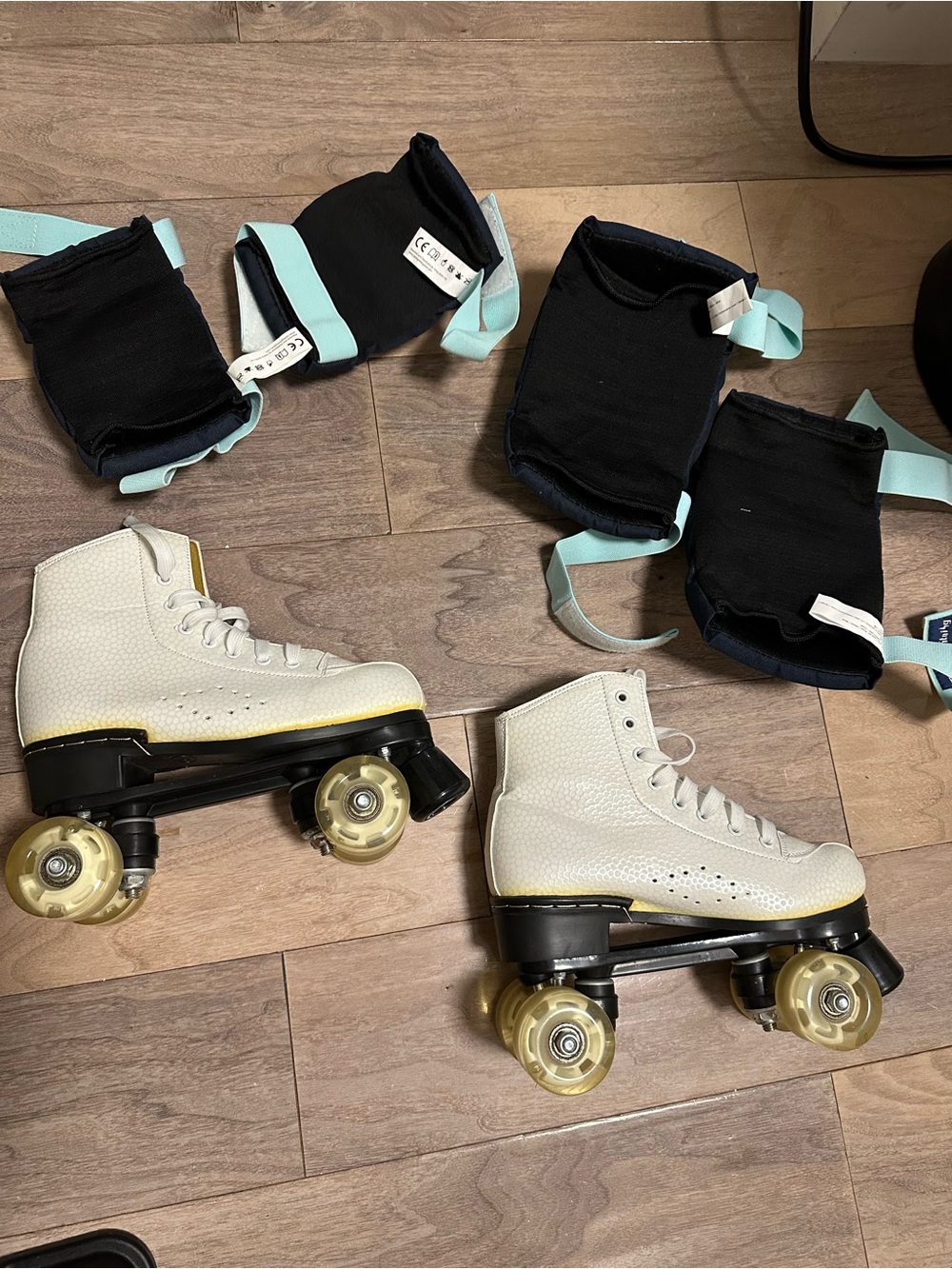 White Adult Quad Roller Skates with Protective Gear
